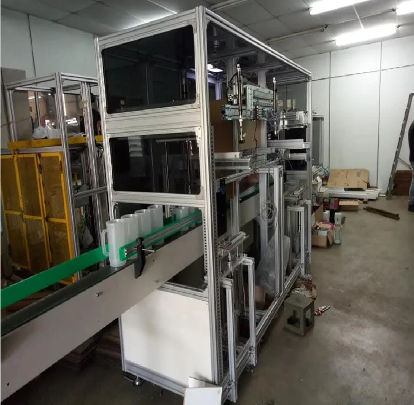 Custom automation equipment with a conveyor shown in the company profile