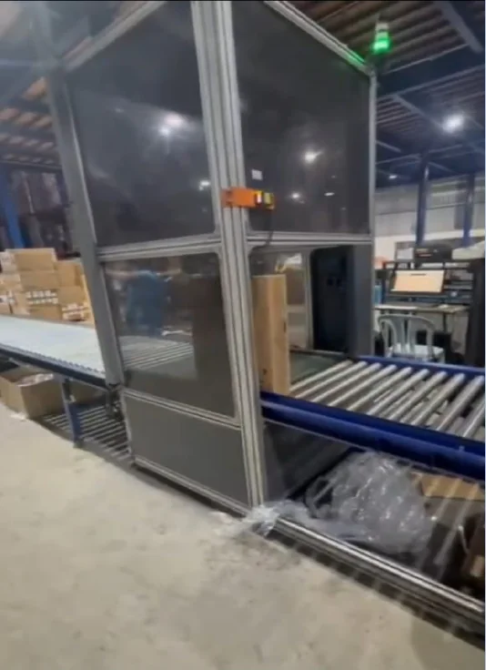DWS equipment with a roller conveyor shown in the company profile